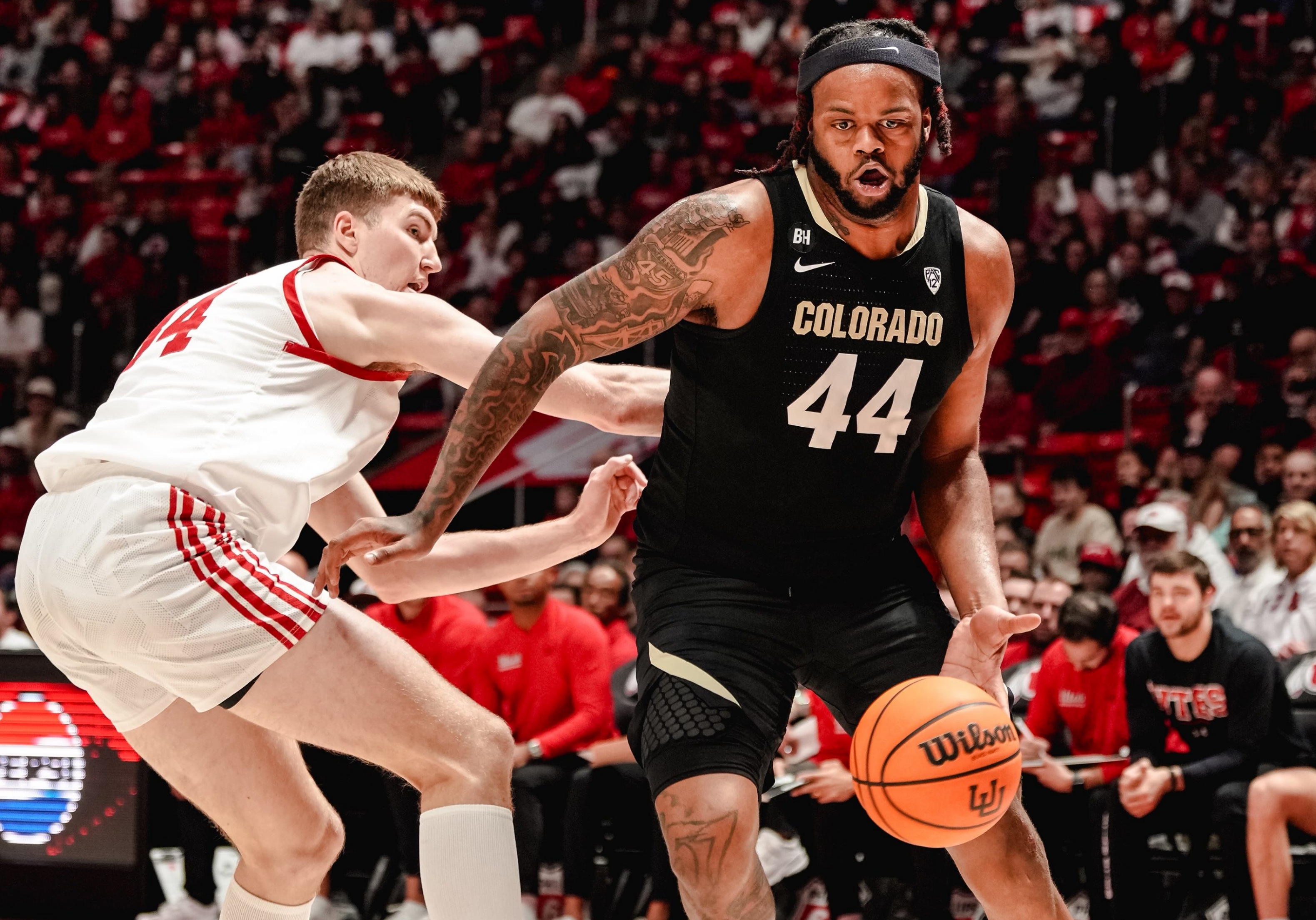 Eddie Lampkin Jr drives around Utah defender